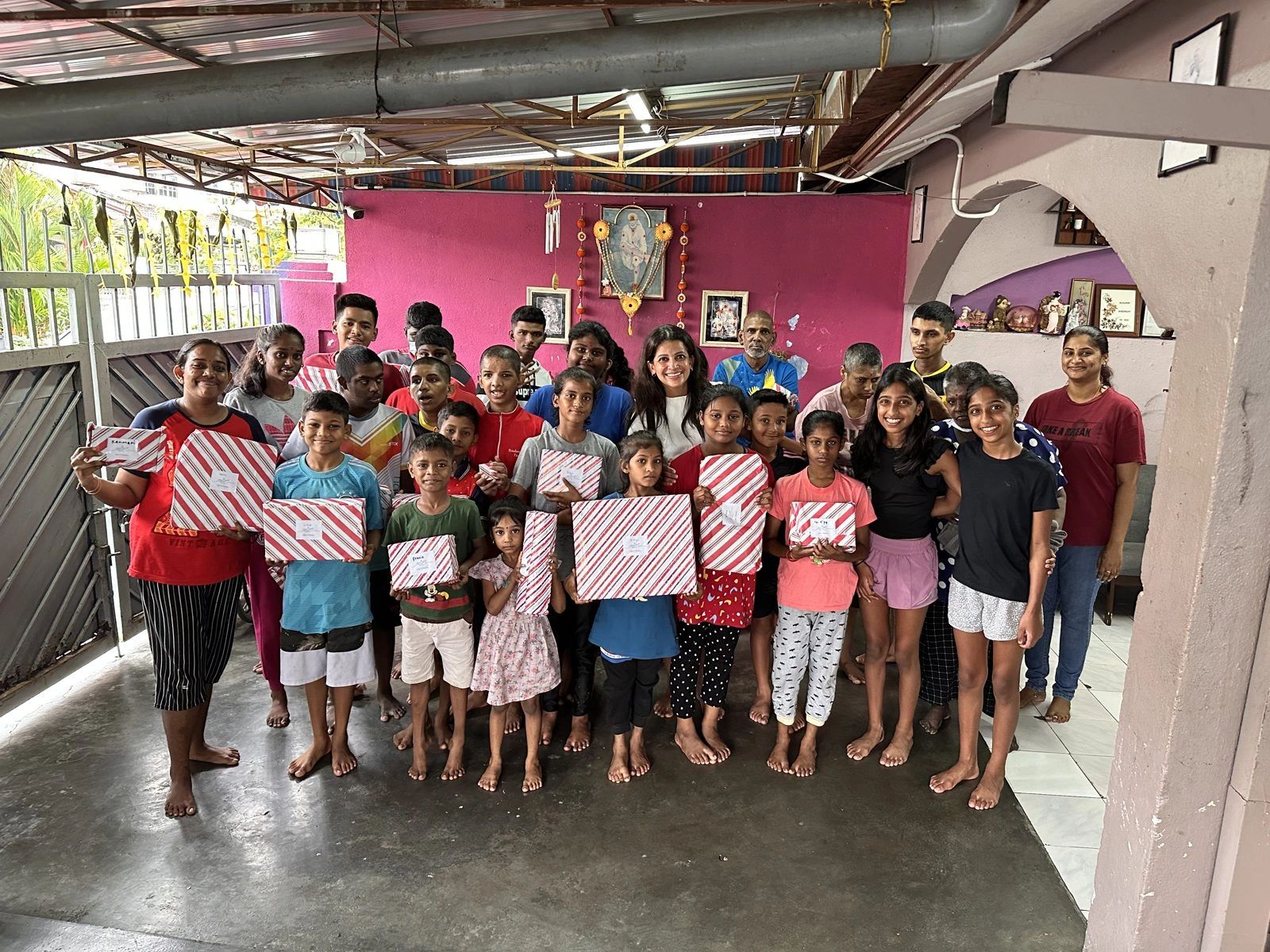 Presenting gifts at Thangam Ilam Welfare Society